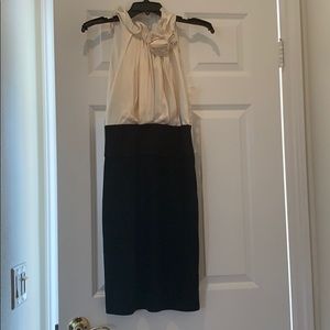 Like new BCBG dress- size 2 button up side